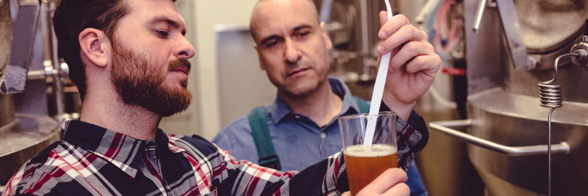 owner examining beer